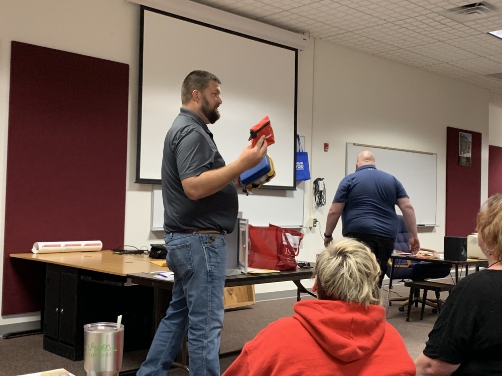 Justin Pritts - shows AED the Cherokee Emergency Management System is providing to Washta. 